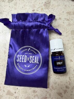Young Living Loyalty Essential Oil with Purple Satin Pouch New/sealed bottle